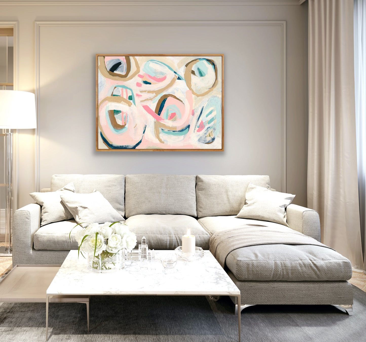 soft, swirls of neutral tones, pinks and blues, harmoniously laid out and framed with a timber box frame.